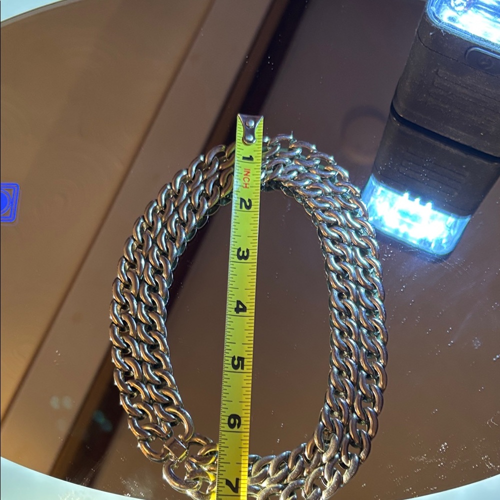 Elegant silver tone  Chain choker necklace, I don’t know what it is made out of.